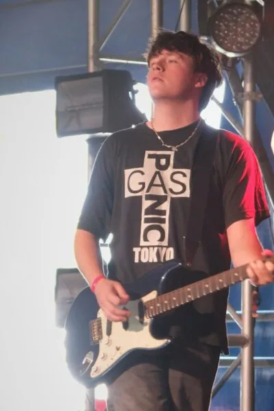 Alex Turner of The Kabins playing guitar